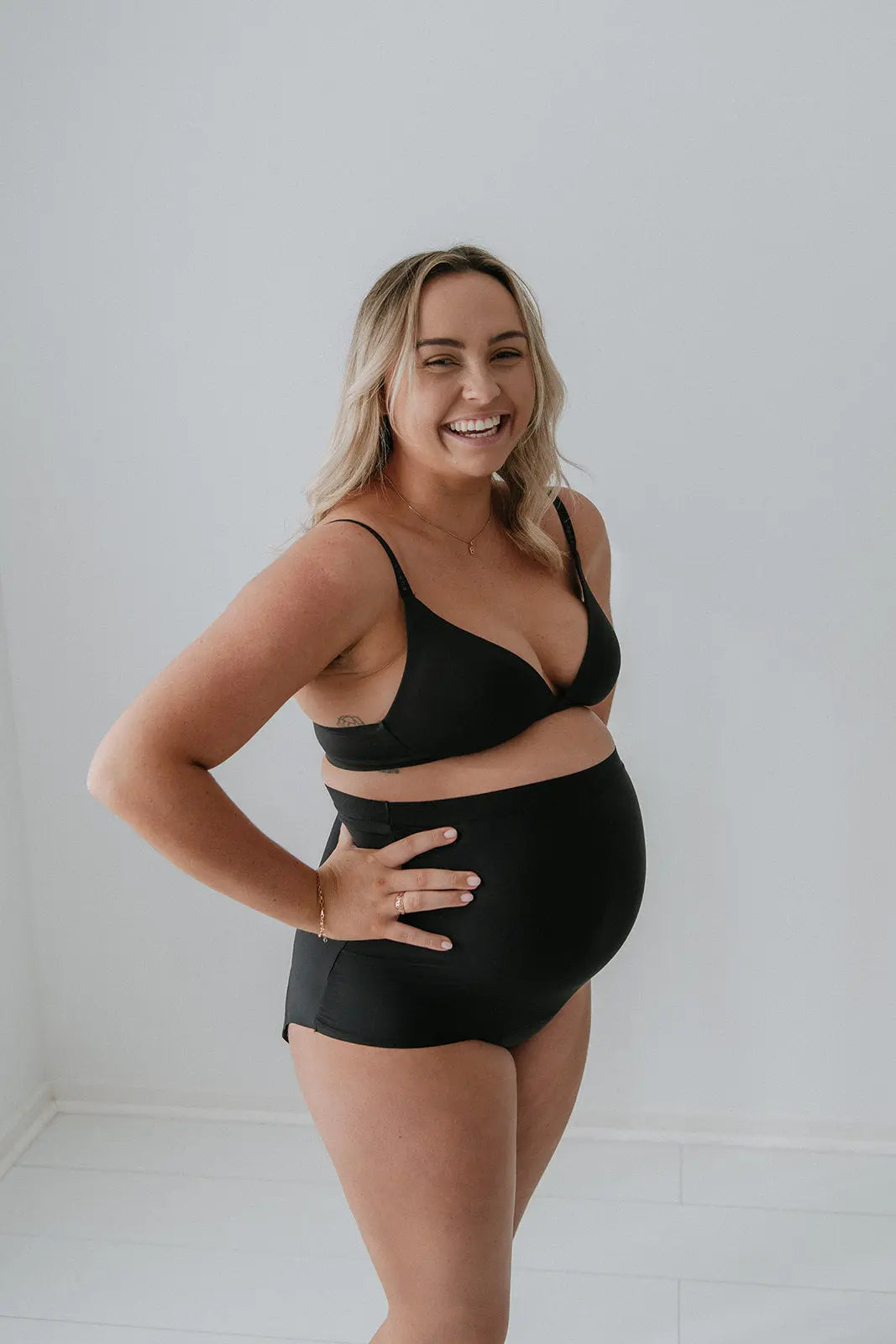 Side view of Mummy Undies maternity underwear, highlighting soft fabric and full belly coverage for pregnancy and postpartum